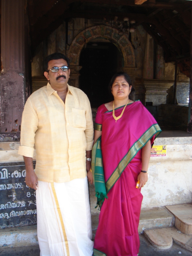 Rajesh and Viji in front of Kadamattom church