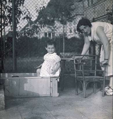 Anne in the SandboxAnne Frank and her mother in their yard on Marbachweg (Frankfurt), 1931.